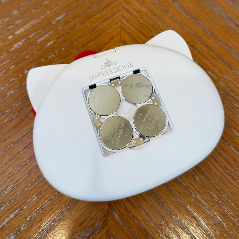 Impressions Vanity Hello Kitty Wireless Light Up Compact Mirror